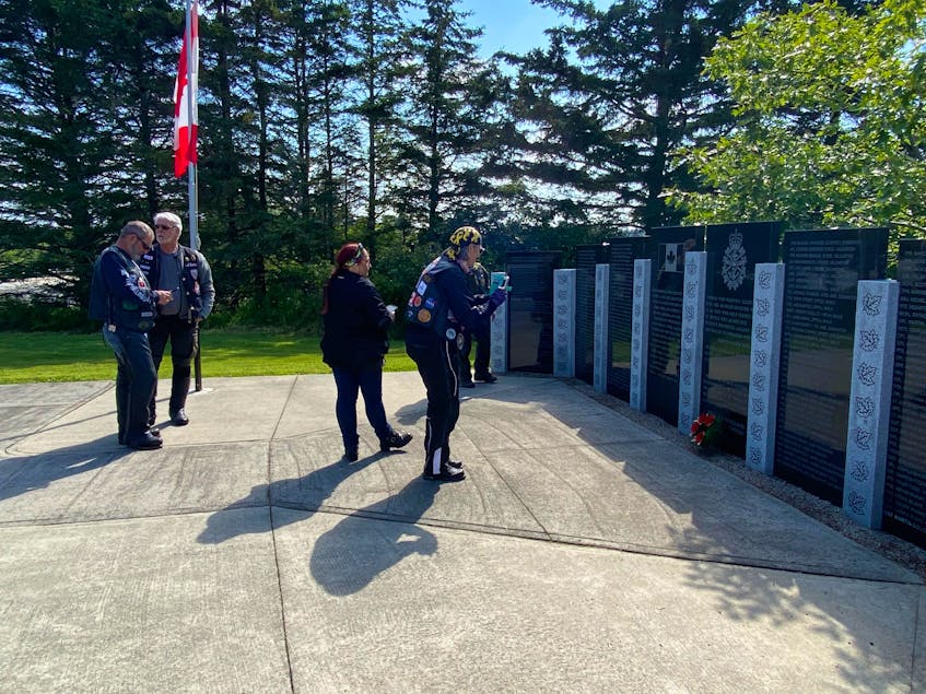 Members of the Rolling Barrage pay their respects at the Afghanistan Monument, located at the Maple Grove Educational Centre.CARLA ALLEN • TRI-COUNTY VANGUARD