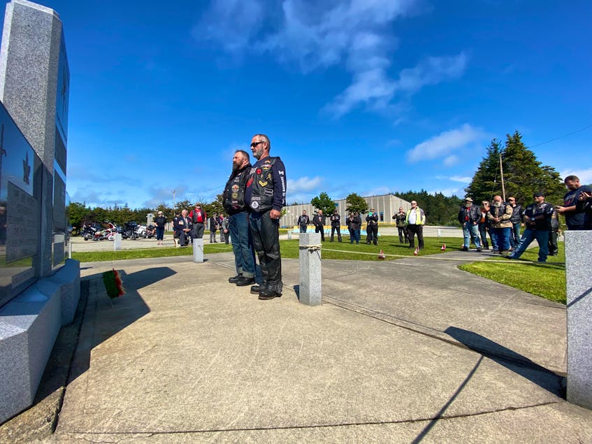 Rolling Barrage PTSD Foundation directors Paul Harman, (national executive chair) and Jim Gordon pay their respects on Aug. 2 at the Afghanistan Monument, located at the Maple Grove Educational Centre.CARLA ALLEN • TRI-COUNTY VANGUARD