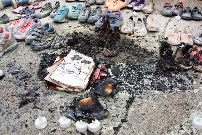 Calgary police are investigating a small fire that occurred at the residential school memorial outside city hall last night. Wednesday, August 4, 2021. 