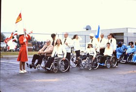 The P.E.I. team takes part in the Canadian Wheelchair Sports Association nationals in Cambridge, Ont. in 1976 before the Paralympics. At the front of the line of athletes, seated right, is Lynn Stewart. Contributed