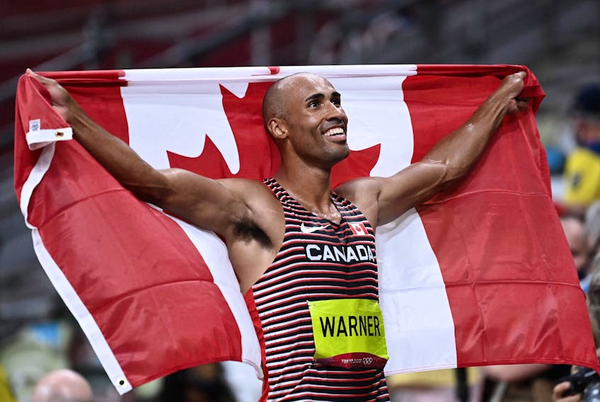 Canada's Damian Warner reacts after winning the men's decathlon event during the Tokyo 2020 Olympic Games at the Olympic Stadium in Tokyo on August 5, 2021. 