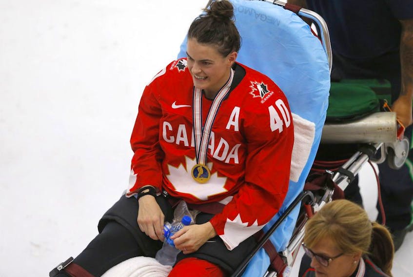  Team Canada’s Blayre Turnbull injured her leg during celebrating their win over Team USA in overtime during the 2021 IIHF Women’s World Championship gold-medal game at WinSport’s Markin MacPhail Centre in Calgary on Tuesday, Aug. 31, 2021.