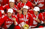  Team Canada celebrates after defeating Team USA in overtime to win the 2021 IIHF Women’s World Championship gold medal at WinSport’s Markin MacPhail Centre arena in Calgary on Tuesday, Aug. 31, 2021.