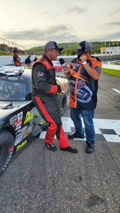 Craig Slaunwhite, left, does an interview after winning his second straight East Coast International Pro Stock Tour race on Aug. 21.  - Contributed