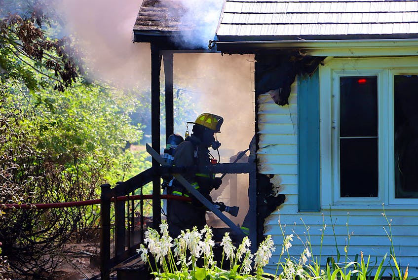Kentville firefighters made entry into a home on Lantzy Road Sept. 1 in order to minimize the spread of fire. 
ADRIAN JOHNSTONE
