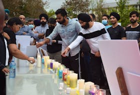 Candles and flowers were laid in memory of Prabhjot Singh Katri.