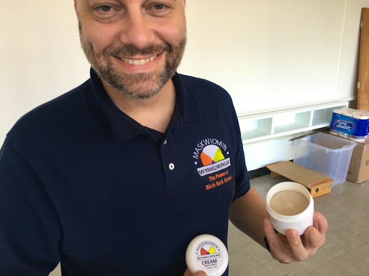 Matthias Bierenstiel shows off the cream he and business partner, Tuma Young, are selling under the name Maskwiomin. ARDELLE REYNOLDS/CAPE BRETON POST
