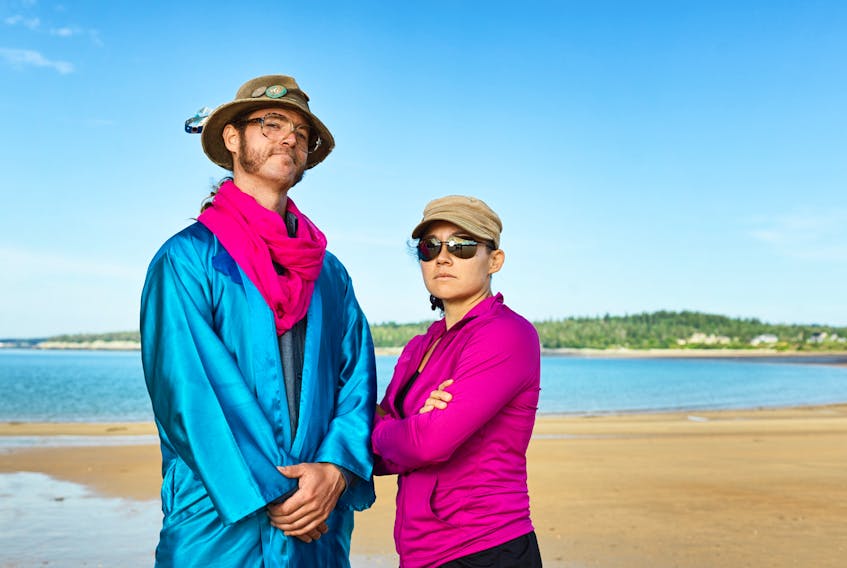 A publicity shot from Race Against the Tide shows Abe Waterman of Murray Harbour, P.E.I., with his teammate, Sue McGrew. The show was filmed on the beaches of the Bay of Fundy.