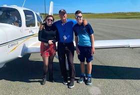 Alyssa Rose, left, and Jax Gaudet, right, are two teens who have battled illness and conducted several fundraisers. They recently got to meet for a flight over Cape Breton thanks to pilot Dimitri Neonakis. 