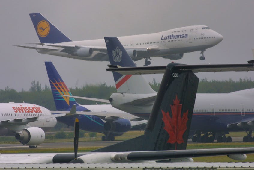 FOR 9/11 ANNIVERSARY:
Some of the 42 international passenger aircraft, arrive in Nova Scotia after airspace was closed following the 9/11 attack at Halifax Stanfield International Airport September 11, 2001.

TIM KROCHAK PHOTO