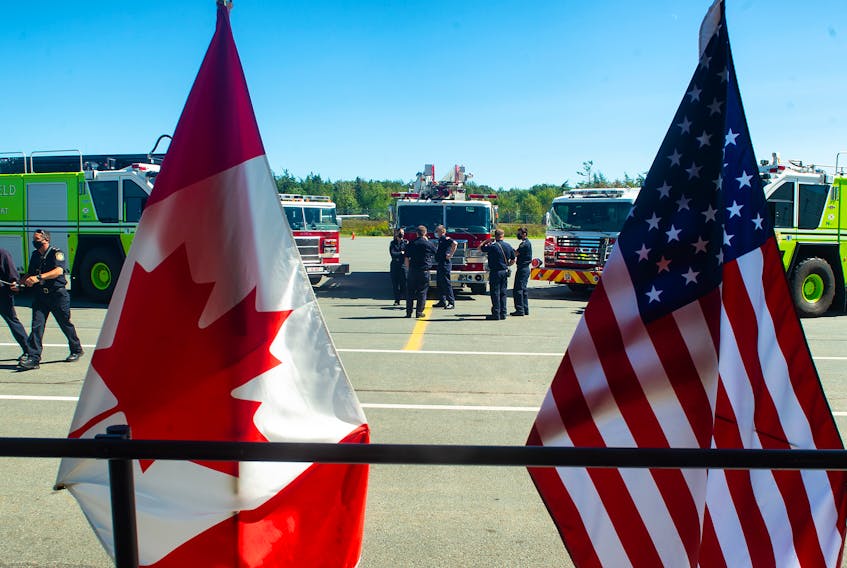 Fire trucks are lined up outside at the Halifax Stanfield Airport for a ceremony on Saturday afternoon marking the 20th anniversary of the Sept. 11 terrorist attacks.