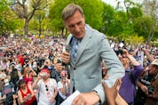  People’s Party of Canada Leader Maxime Bernier prepares to speak at a protest against COVID-19 restrictions, in Toronto on May 15, 2021.