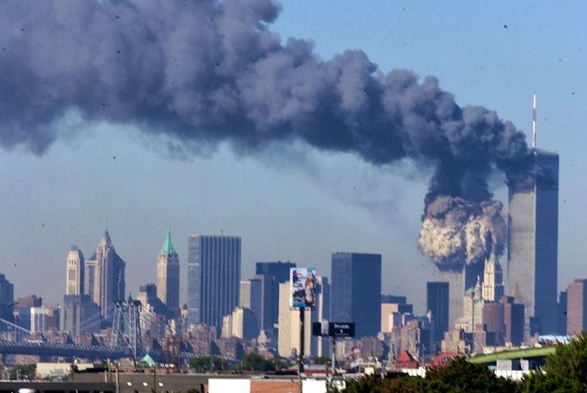  One of the buildings making up the World Trade Center collapses on Sept. 11, 2001. In parallel attacks in New York City and Washington, planes crashed into each of the twin towers of the World Trade Center and the Pentagon.