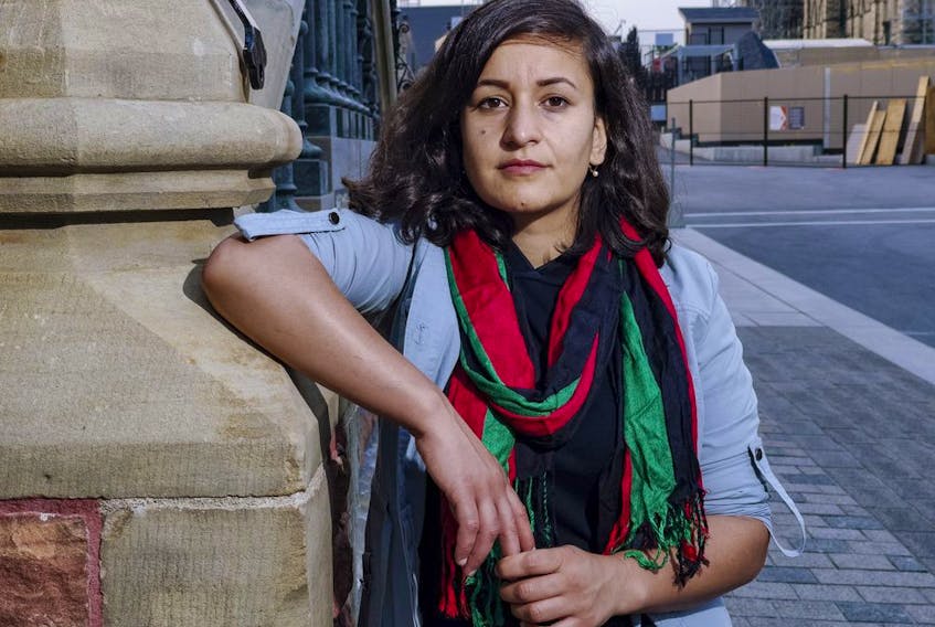 Roya Shams, 26, is an Ottawa woman who fled Afghanistan after her father was gunned down by the Taliban one decade ago. 