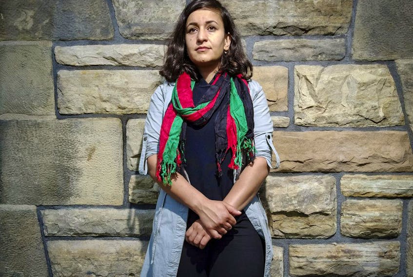  Roya Shams, 26, is an Ottawa woman who fled Afghanistan after her father was gunned down by the Taliban one decade ago.