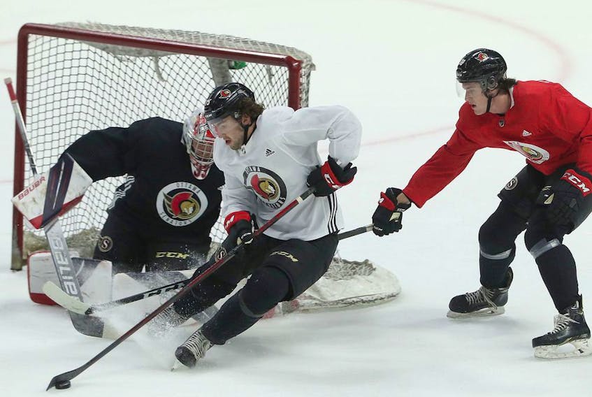  Forward Egor Sokolov drives to the net during an on-ice development camp session on Saturday.