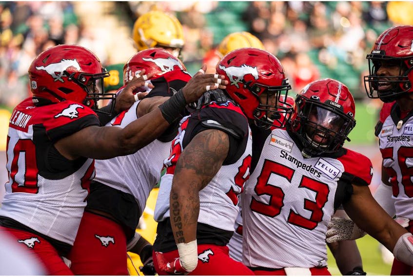 Calgary Stampeders' Stefen Banks (95) is celebrated by teammates during first half CFL football action versus the Edmonton Elks at Commonwealth Stadium in Edmonton, on Saturday, Sept. 11, 2021. Photo by Ian Kucerak