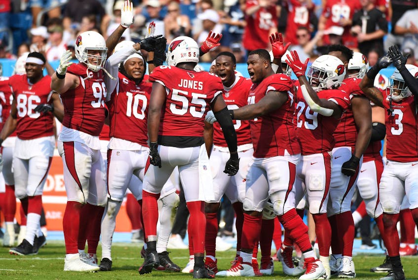  Arizona Cardinals defensive end Chandler Jones (55) celebrates with teammates after a sack on fourth down during the second half against the Tennessee Titans at Nissan Stadium. Mandatory Credit: Christopher Hanewinckel-USA TODAY Sports