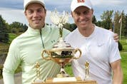  Inglewood’s dynamic duo of Gerry Macdonald, left, and John Deering reclaimed the Rileys Best Ball main event trophy in 2021. (Courtesy of Calgary Golf Association)
