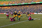 The Edmonton Elks battle the Calgary Stampeders during first half CFL football action at Commonwealth Stadium in Edmonton, on Saturday, Sept. 11, 2021. Photo by Ian Kucerak