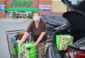 Neila Mullins of Bateson leaves Sobeys in Sydney after doing some grocery shopping early Monday afternoon. Although as of Wednesday masks will no longer be mandatory in indoor places in Nova Scotia, Mullins said she wore a mask before they were mandatory and will continue to wear one after the restriction is lifted. Sharon Montgomery-Dupe/Cape Breton Post
