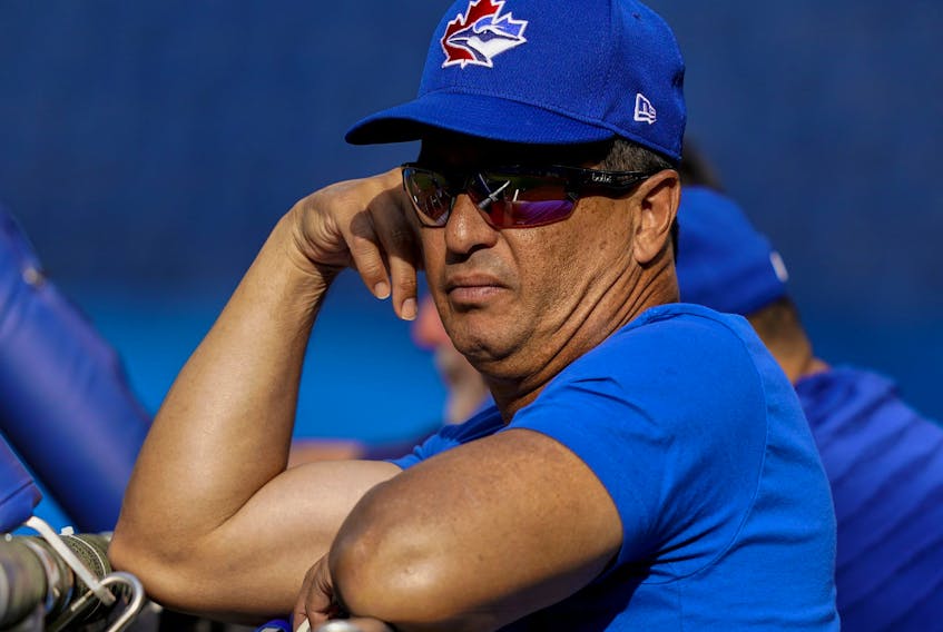 Blue Jays manager Charlie Montoyo watches batting practice before a game at the Rogers Centre.