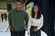 Leylah Annie Fernandez makes a joke about "having to make herself taller" as she walks beside Félix Auger-Aliassime at a news conference in Dorval on Tuesday, September 14, 2021, a few days after their participation in the U.S. Open Tennis tournament. 