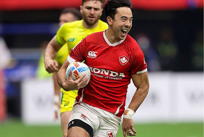 Nathan Hirayama of Canada smiles as he breaks away during their semifinal rugby sevens match against Australia at B.C. Place Stadium on March 8, 2020.