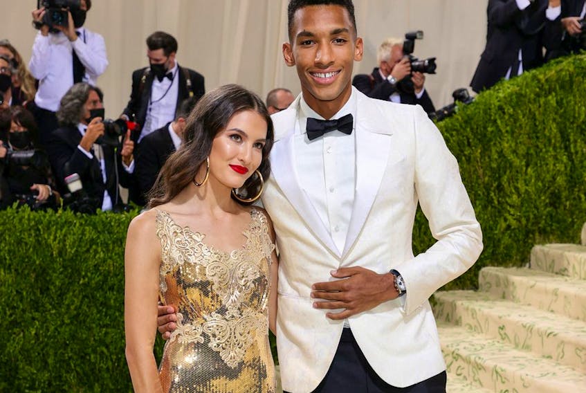  Félix Auger-Aliassime and guest attend The 2021 Met Gala Celebrating In America: A Lexicon Of Fashion at Metropolitan Museum of Art on September 13, 2021, in New York City.
