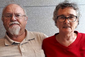 Wayne and Debbie Mailman who were in Florida last year and contracted COVID-19, are facing steep medical bills for their time in hospital in the U.S. Here they are seated at the at the McDonald's restaurant in New Minas.