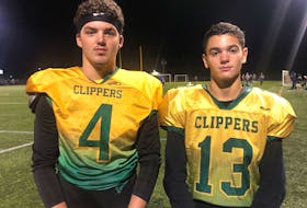 Summerside Clippers quarterback Lucas Doucette, left, and receiver Zack Blood connected on five passes leading to one touchdown during a game between the Cornwall varsity Timberwolves at Eric Johnson Field in Summerside of Friday, Sept. 10. 