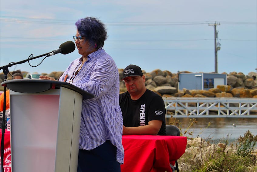 Assembly of First Nations National Chief RoseAnne Archibald speaking to a crowd of supporters at the wharf in Saulnierville as Chief Mike Sack of Sipekne'katik First Nation looks on. Archibald was in southwestern Nova Scotia to show support for Mi'kmaw fisheries exercising their treaty right to fish. Contributed • Sandra Conrad