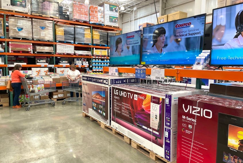 Televisions are displayed at a Costco store on July 13, 2021.