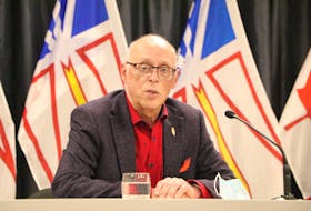 Newfoundland and Labrador Minister of Health and Community John Haggie speaks to members of the media Thursday about ambulance services in the province.  