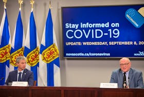 Nova Scotia Premier Tim Houston and Dr. Robert Strang, chief medical officer of health, hold a COVID-19 news briefing Wednesday in Halifax. During the briefing they announced plans to move into Phase 5 on Sept. 15. - Communications Nova Scotia