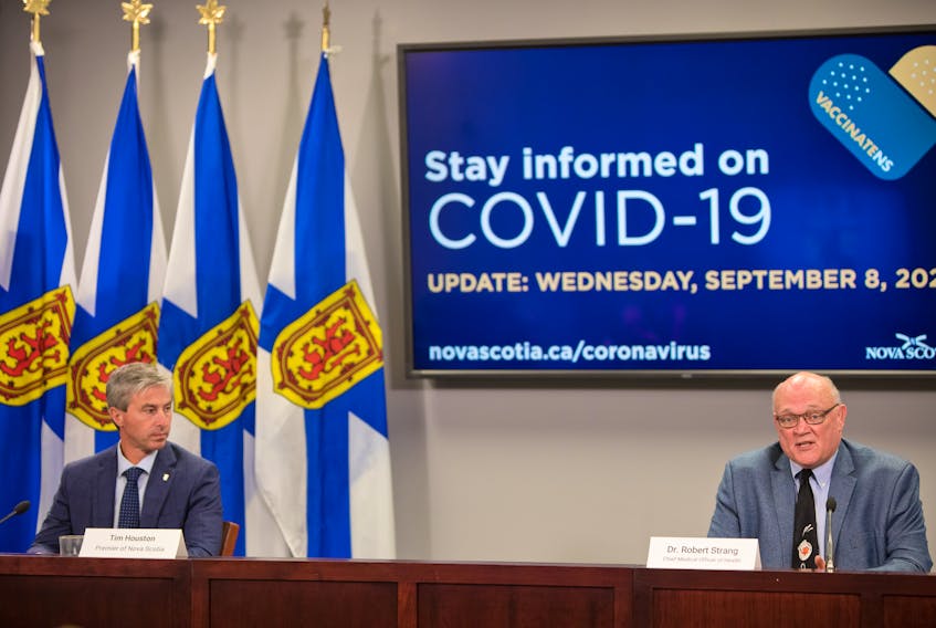 Nova Scotia Premier Tim Houston and Dr. Robert Strang, chief medical officer of health, hold a COVID-19 news briefing Wednesday in Halifax. During the briefing they announced plans to move into Phase 5 on Sept. 15. - Communications Nova Scotia