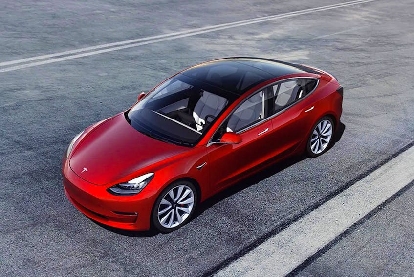 Tesla cars, like the Model 3 shown here, may some day feature laser beams instead of windshield wipers. Handout/Tesla