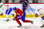 Rafael Harvey-Pinard, left, Isiah Campbell and Gianni Fairbrother, right, take a fast lap during first day of Montreal Canadiens' rookie camp at the Bell Sports Complex in Brossard on Thursday, Sept. 16, 2021.