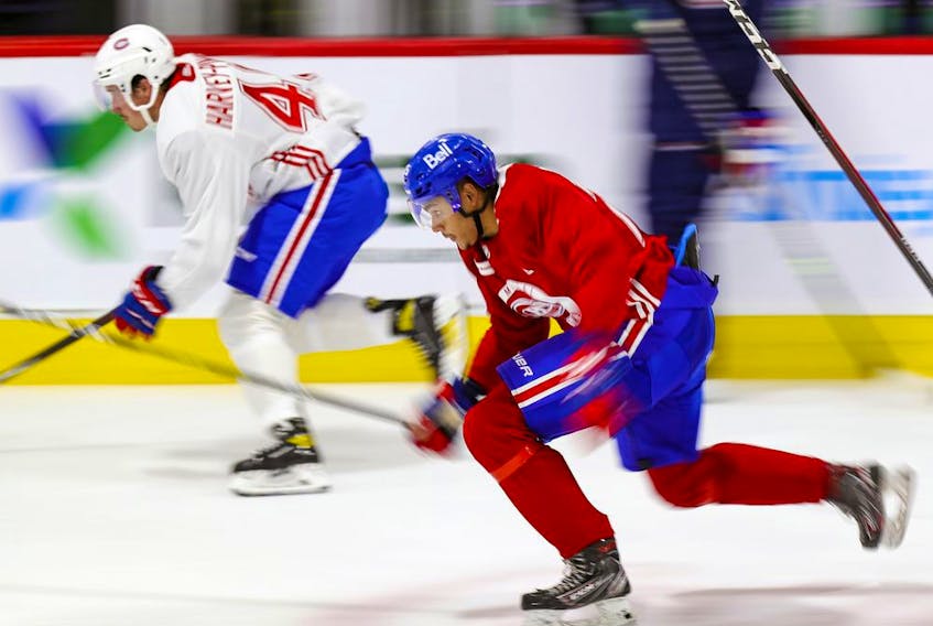 Rafael Harvey-Pinard (left) and Isiah Campbell take a fast lap around the rink at Bell Sports Complex in Brossard during Canadiens rookie camp Thursday.