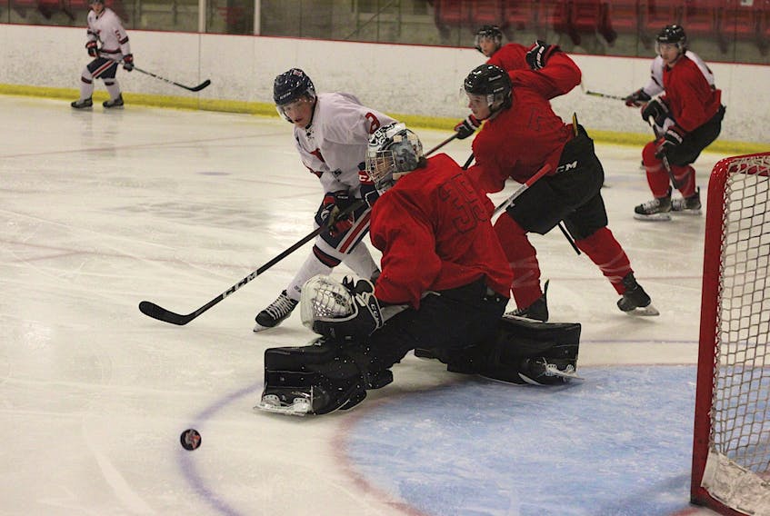 Valley Wildcats forward Ethan Kearney locates the puck after Truro Bearcats goalie Felix Anthony Ethier makes the stop on a shot from the blue-line during Maritime Junior Hockey League pre-season action Sept. 17 at the Kings Mutual Century Centre in Berwick.