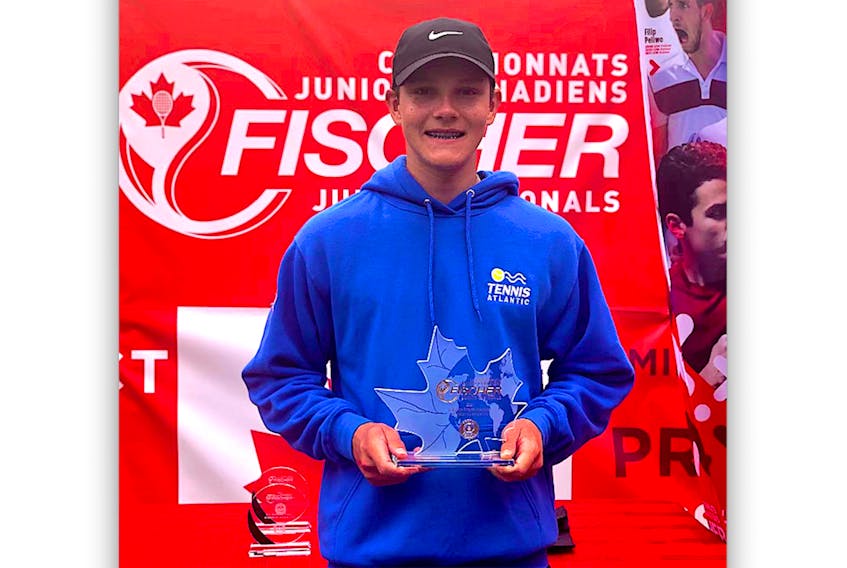 Liam Drover-Mattinen of Portugal Cove St. Philip’s poses with the championship trophy after winning the boys singles title at the Fischer Canadian under-16 2021 outdoor tennis championship in Milton, Ont., on Friday. Drover-Mattinen had even more reason to smile; right after his win, he was told he has been added to Canada’s team for the upcoming Junior Davis Cup. That event, featuring some of the world’s top U16 players, begins Sept. 28 in Antalya, Turkey. — Contributed photo