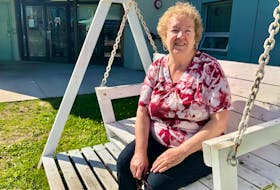 Irene Dixon sits on one of the swinging benches outside her senior apartment complex in downtown Sydney. As a senior on a fixed income, Dixon can't think of any campaign platforms discussing senior care or elder needs by any party running in Canada's upcoming election on Monday. NICOLE SULLIVAN/CAPE BRETON POST 