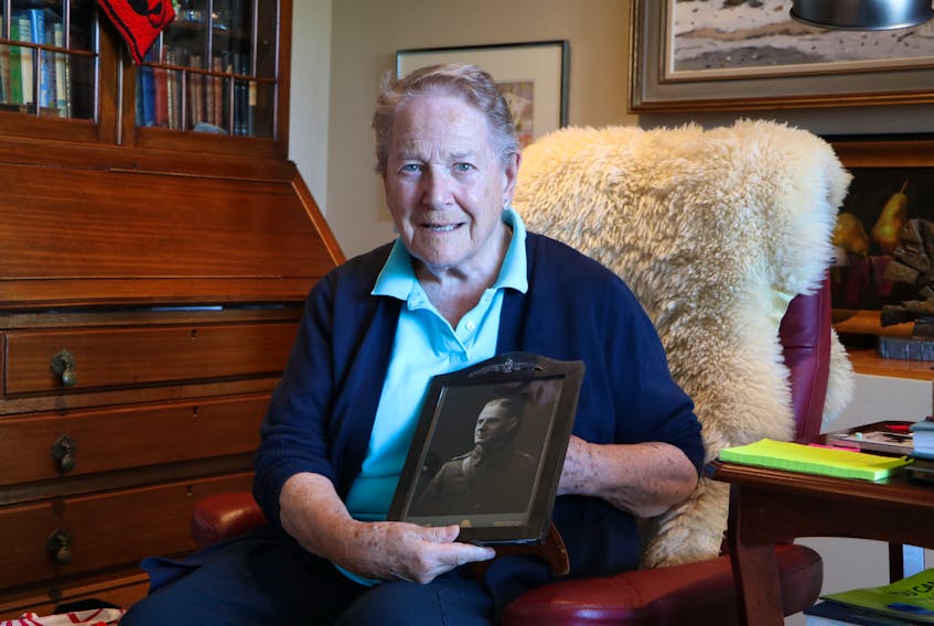Kathleen Knowling holds a photo of her father, Ronald Ayre, a First World War bomber pilot. Newfoundlanders who served as airmen in the First World War are to be officially recognized Sunday at the National War Memorial in St. John's.