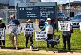 Protesters concerned with a government policy they say is being abused to male prisoners, to harm female inmates, gathered outside Truro's Nova Institution for Women Saturday afternoon.