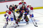 There's a lot of traffic in front of Canadiens netminder Joe Vrbetic during the first period of the game against the Senators. Those in front include Montreal's Mattias Norlander (59) and Kaiden Guhle (21) and Ottawa's Carson Latimer (78) and Mark Kastelic (47).