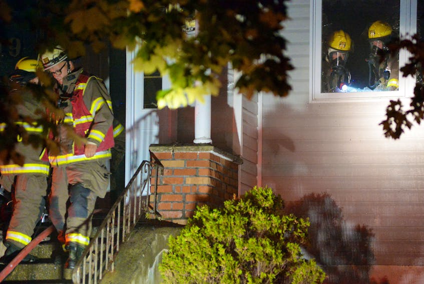 A house was extensively damaged during an early morning house fire in St. John's Sunday. Keith Gosse/The Telegram