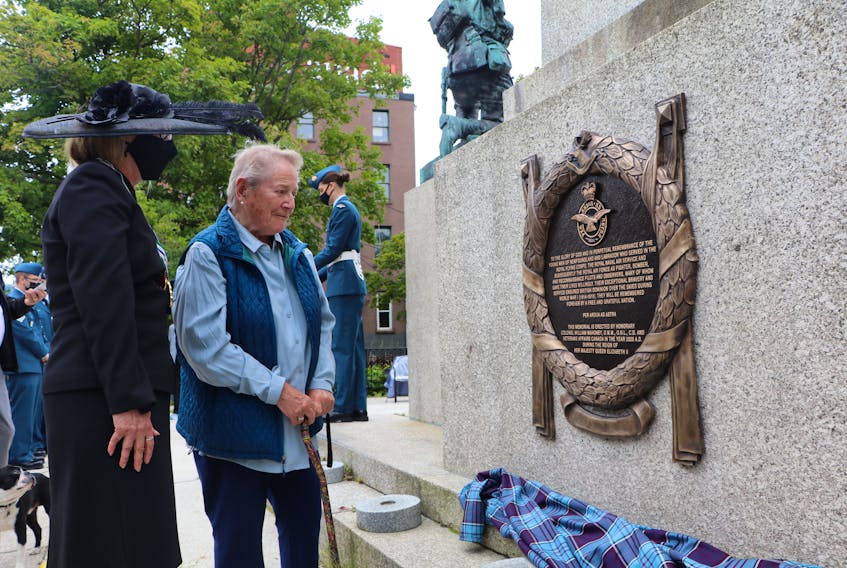 Lt.-Gov. Judy Foote (left) and Kathleen Knowling, 93, discuss the plaque the two just unveiled during the Battle of Britain Remembrance ceremony at the National War Memorial in St. John’s on Sunday. The plaque honours Newfoundland airmen during the First World War. Knowling’s father, Ronald Ayre, was a First World War bomber pilot who flew 41 missions into enemy territory.