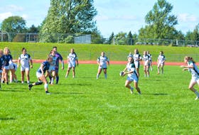 The UPEI Panthers’ Maddy Clements makes a pass during the team’s Atlantic University sport women’s rugby season and home opener against the St. Francis Xavier X-Women in Charlottetown on Sept. 11. Clements scored the Panthers’ lone try in a 22-5 loss to the host Acadia Axewomen on Sept. 18.