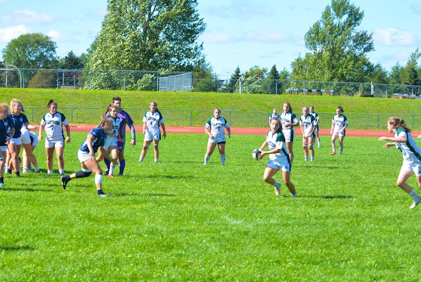 The UPEI Panthers’ Maddy Clements makes a pass during the team’s Atlantic University sport women’s rugby season and home opener against the St. Francis Xavier X-Women in Charlottetown on Sept. 11. Clements scored the Panthers’ lone try in a 22-5 loss to the host Acadia Axewomen on Sept. 18.