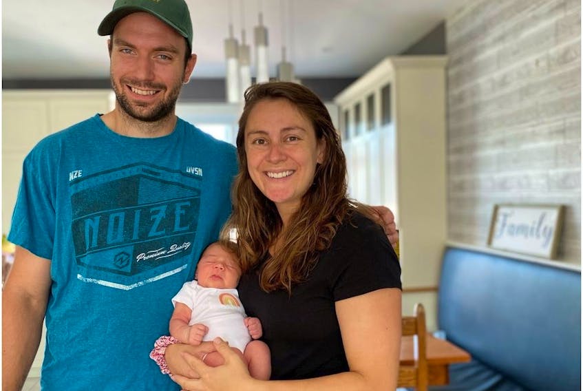  Former Canadiens strength and conditioning co-ordinator Patrick Delisle-Houde with wife Chelsea Saunders and two-week-old Adeline. Delisle-Houde returned to his alma mater, McGill University, as an assistant coach with the Redbirds while completing his PhD.